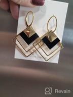 img 1 attached to Gold Plated Geometric Statement Earrings for Women and Girls - Black and White Dangle Drop Fashion Jewelry review by Alicia Fraser