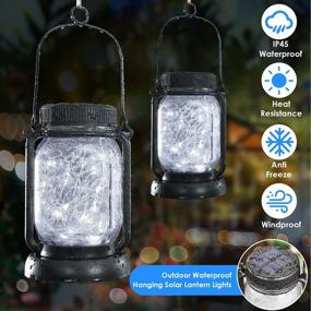 img 2 attached to Solar Hanging Mason Jar Lights With Stakes (4-Pack) - Outdoor Waterproof Decorative Solar Lantern Lamp, Vintage Glass Jar Starry Fairy Light With 30 LEDs For Patio Garden Tree Yard