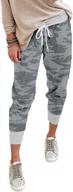 sporty women's tapered joggers with pockets, elastic waist and drawstring for running and casual wear logo