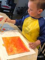 img 1 attached to Bassion 2 Pack Kids Art Smocks Toddler Smock Waterproof Artist Painting Aprons Long Sleeve With 3 Pockets For Age 2-6 Years review by Serena Scott