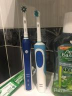 img 1 attached to Electric Toothbrush Oral-B PRO 2 2000 Cross Action, white/blue review by Jasmit Singh ᠌