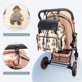 img 3 attached to 👜 Stylish Cream Diaper Bag Backpack with Stroller Hooks by Pipi Bear - Jacquard Multi-function Baby Bag for Mom and Dad
