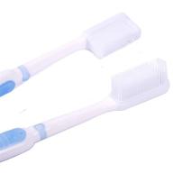 bacteria-fighting toothbrush with gentle silicone bristles logo