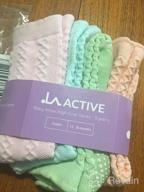 img 1 attached to Stay Cozy This Winter With LA Active Knee High Grip Socks For Kids review by Eric Fuego