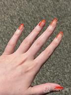 картинка 1 прикреплена к отзыву Глянцевые накладные ногти миндалевидной формы с оранжевыми и белыми полосами, 24 шт., акриловый набор для ногтей для французского прессования, наклеенные советы по искусству ногтей для женщин и девочек от Jeff Langford