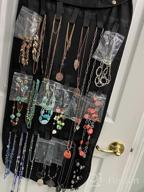 img 1 attached to Caroeas Dual-Sided Jewelry Display Bag - Hanging Closet Organizer With Metal Hanger, Foldable Necklace And Earring Holder, Dust-Proof Accessory Organizer For Rings, Watches And More (Black) review by Lisa Bell