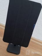 img 1 attached to Compatible Cell Phone Stand Holder For Desk - Fits All Smart Phones | Apiker, Black review by Ben Duncan