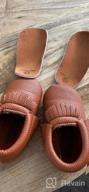 img 1 attached to Adorable And Comfortable Baby Moccasins: Delebao Soft Sole Tassel Crib Shoes review by Derrick Shaw