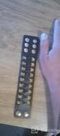 img 1 attached to Wide Leather Wristband Bracelet with Punk Rivet Spike Design review by Tim Pulse