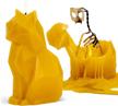 pyropet mustard yellow cat candle with aluminum skeleton - unique 7” tall gift for cat lovers, mom, wife, girlfriend - 25 hour burn time - perfect for christmas gifts logo