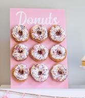 donut wall display stand with pink dot design - perfect for gender reveal, birthday or baby shower! logo