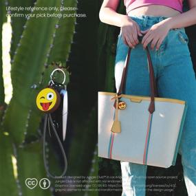 img 1 attached to MojiTag Waterproof AirTag Keychain: Stylish Holder for Keys and Pet Trackers, Multiple Colors with Heart & Wink Design