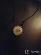 img 1 attached to Experience Chakra Healing Energy with 🧘 Our Luminous Orgonite Pendant Om Symbol Necklace review by Kyle Deel