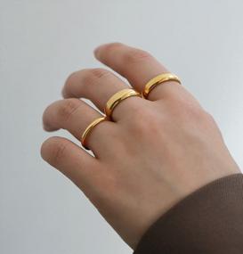 img 2 attached to Стильные кольца из 14-каратного золота с кубическим цирконием для женщин | тонкая эффектная лента | Размеры 6-9 | 3шт набор
