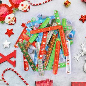 img 1 attached to Get In The Festive Spirit With Latocos' 48 PCS Christmas Slap Bracelets For Kids - Snap Up Wristbands Featuring Santa Claus, Snowman And Christmas Tree For The Ultimate Party Favor!