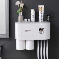 streamline your bathroom routine with a multifunctional wall-mounted toothbrush holder and automatic toothpaste dispenser in sleek grey design logo