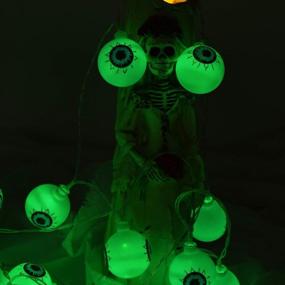 img 3 attached to 30 LED Green Halloween Eyeball String Lights With Remote, Waterproof Battery Operated Fairy Lights For Indoor/Outdoor Party, Christmas, And Halloween Decorations - 8 Modes Available - ILLUMINEW