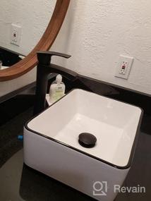 img 6 attached to Черно-белая керамическая раковина для ванной комнаты, фарфоровая раковина над прилавком с черным смесителем и выдвижным сливом, круглая