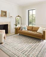 ivory eden collection area rug by rifle paper co. x loloi - 8'-6" x 11'-6 logo