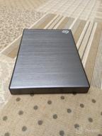 img 2 attached to 🔜 Seagate Backup Plus Slim STHN2000400 2TB Portable Hard Drive - Black: Your Reliable External Storage Solution review by Rimba ᠌