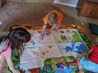 img 1 attached to Extra Large Dinosaur Water Drawing Mat For Kids Coloring Painting, Educational Toys Gifts For Boys Girls Toddlers Age 3 Up 58X42 Inches review by Brett Bush