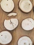 картинка 1 прикреплена к отзыву 🌳 30Pcs Unfinished Wood Slices 2.4"-2.8" | Natural Wooden Circle Kit with Pre-drilled Hole for Rustic Wedding Decorations, Round Coasters, Halloween & Christmas Ornaments | DIY Arts & Crafts от Steve Yang