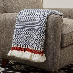 img 4 attached to Amazon Brand – Rivet Modern Hand-Woven Stripe Fringe Throw Blanket, 50" X 60", Navy Blue And White With Sienna Orange