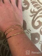 картинка 1 прикреплена к отзыву Браслет Дружбы в подарок для нее: Браслет Morse 👯 кода SANNYRA с бисером покрытым 14k золотом на шёлковой нити от Mike Kimball