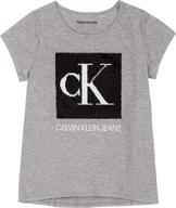 stylish calvin klein flippable camelia 10 girls' tops, tees & blouses logo