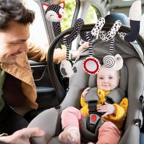 img 2 attached to Развлеките своего ребенка на ходу с черно-белой спиральной игрушкой лисы для автомобильных сидений и кроваток!
