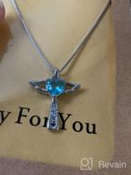 img 1 attached to Angel Birthstone Heart Cross Necklace with Cubic Zirconia Wings for Girls, Women, and Kids! Perfect Valentine's and Birthday Gift. review by Arlene Martinez