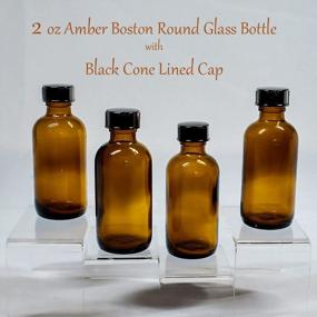 img 3 attached to 24-Pack 2 Oz. Amber Boston Round Glass Bottles With Black Cone Caps - GBO GLASSBOTTLEOUTLET.COM