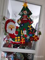 картинка 1 прикреплена к отзыву Набор рождественской елки из войлока 3 фута для детской стены, войлочное дерево Shareconn с 31 съемным украшением для малышей, настенные рождественские подарки с украшением Санты от Kevin Ilango