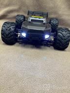 img 1 attached to Experience Thrilling Off-Road Adventures With HAIBOXING 1:18 Scale RC Car 18868 – High-Speed Waterproof All Terrain Truck For Kids And Adults. Two Batteries Provide 40 Minutes Of Non-Stop Playtime! review by Michelle Moore