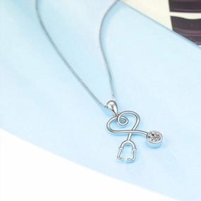 img 2 attached to AOBOCO Sterling Silver Stethoscope Necklace Embellished With Crystals From Austria/Simulated Opal Birthstone, Medical Jewelry For Doctor Nurse Medical Student RN Nurse Gifts For Women