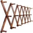 expandable wooden coat rack and accordion hanger with 20 pegs, modern wall mount for hats and jackets, walnut finish by skoloo logo