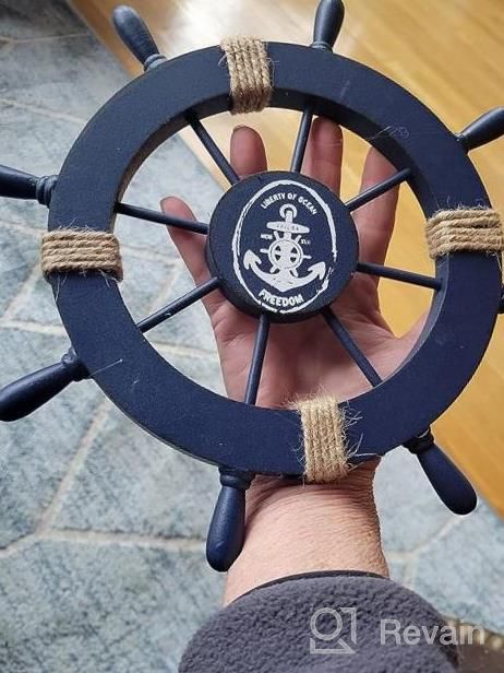img 1 attached to Nautical Beach Home Decor: Rienar Wooden Boat Ship Steering Wheel Fishing Net Shell Wall Art Sail review by Shannon Cool
