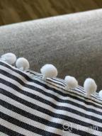 img 1 attached to Add Farmhouse Charm To Your Couch With JOJUSIS Ticking Stripe Pillow Covers With Pom-Poms - Set Of 2 review by Andy Tran