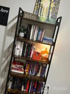 img 1 attached to Rolanstar 6-Tier Black Bookshelf With Industrial Style And Vintage Charm - Perfect For Living Room Or Bedroom review by Ryan Hill