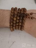 img 1 attached to 108 Prayer Beads Mala Bracelet: Natural Wood Tibetan Buddhist Buddha Meditation Necklace Mala Bracelet for Ultimate Mindful Experiences review by Clint Fick