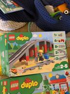 img 2 attached to Enhance Building Fun with LEGO DUPLO Train Bridge and Tracks Set: 26 Building Blocks Included review by Anastazja Olejnik ᠌