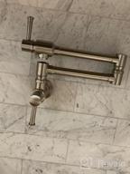 img 1 attached to Commercial Kitchen Sink Faucet - IMLEZON Stainless Steel Pot Filler With Wall Mount, Folding Stretchable Design, Single Hole, And Dual Handles review by Eddie Orrell