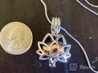 img 1 attached to Lotus Flower Shaped Cremation Jewelry Urn Pendant Necklace for Ashes review by Patricia Casillas