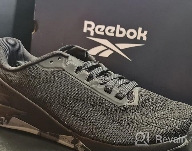 img 1 attached to Men's Black Rubber Athletic Cross Trainer Shoes by Reebok review by David West