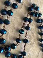 картинка 1 прикреплена к отзыву Винтажное религиозное ожерелье Назаретского магазина с глубокими синими хрустальными бусинами, католическим молитвенным подвеском, включающим медаль и крест с святой почвой Иерусалима - коллекция древних росариев Святой Земли. от Shane Wallace