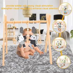 img 2 attached to Foldable Wooden Baby Play Gym with Animal Sensory Hanging Rattle Toys (2 PCS) 👶 and Teething Toys (3 PCS) – Visual, Cognitive, and Sensory Stimulation for Babies 0-12 Months