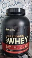 img 1 attached to Optimum Nutrition's Vanilla Ice Cream Gold Standard Whey Protein Powder, 2lb - May Vary in Packaging review by Anand ᠌