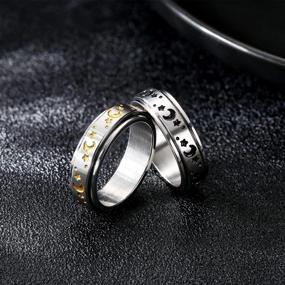 img 1 attached to Stainless Steel Fidget Rings For Anxiety Relief - Gold & Black Star Moon Phase Daisy Spinner Ring Set For Women And Men - Adramata Meditation Rotatable Anxiety Ring - Pack Of 2