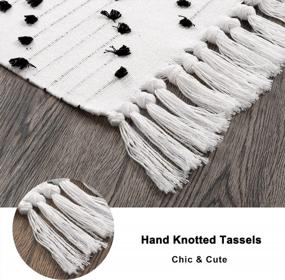 img 2 attached to Chic Boho Washable Cotton Runner Rug For Bathroom And Kitchen, Black And White Moroccan Tribal Tassel Area Rug, 2' X 4.3', Throw Mat Carpet For Living Room And Bedroom Decor By HAOCOO.