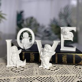img 4 attached to OwMell Set Of 4 Love Letters Cherub Statues, Words Love Little Angel Figurines For Home Decor, White Resin Paintable Sculptures Decoration 4 Inches